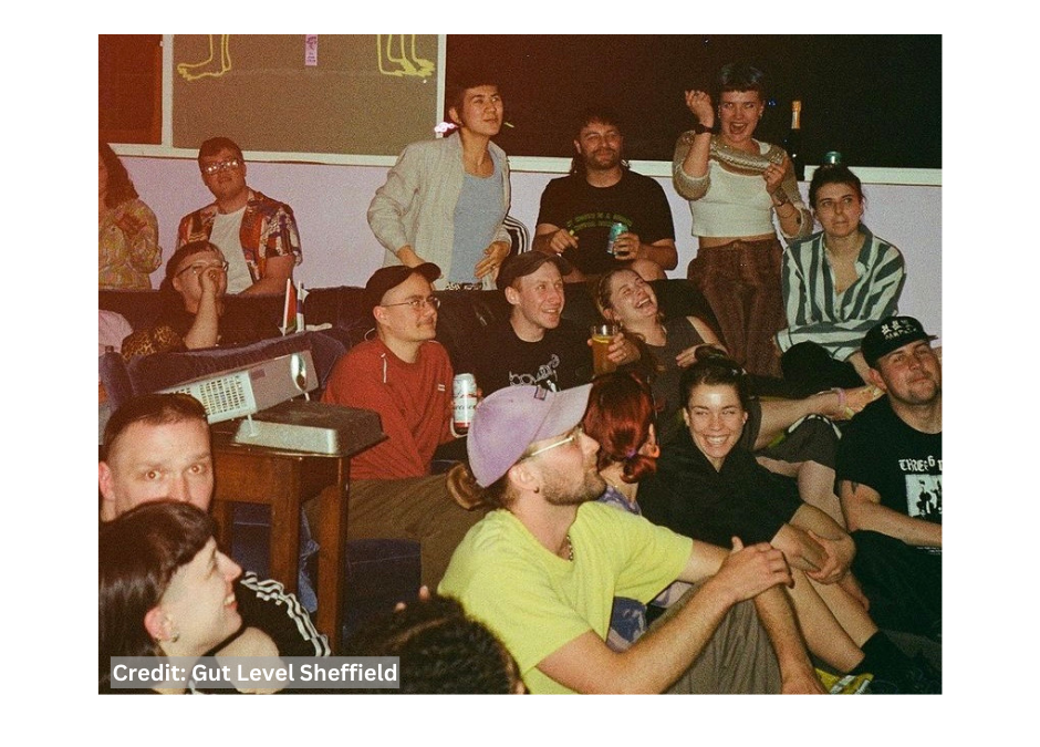 An image of a group of people sat at a Gut Level event