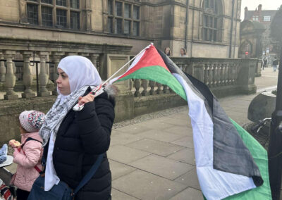 Palestinian protesters at Town Hall call for bank boycott