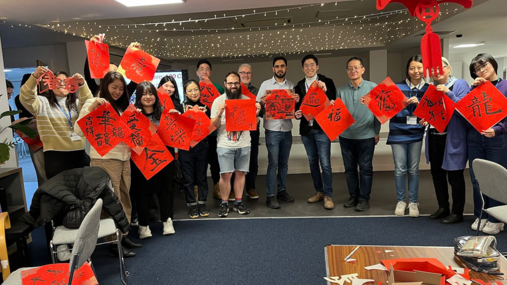 participants and volunteers celebrating Chinese New year together at a past Friend International event