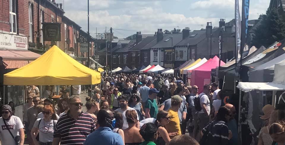 Image of busy crowd at Sharrow Vale Market