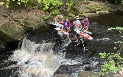 Open water swimmers partake in extreme ironing to campaign for better access to open water
