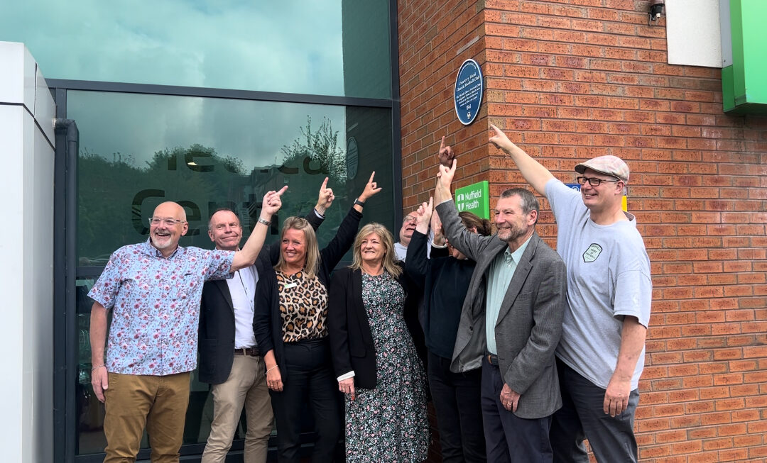 Councillors and members of the Sheffield Home of Football Charity celebrating plaque unveiling