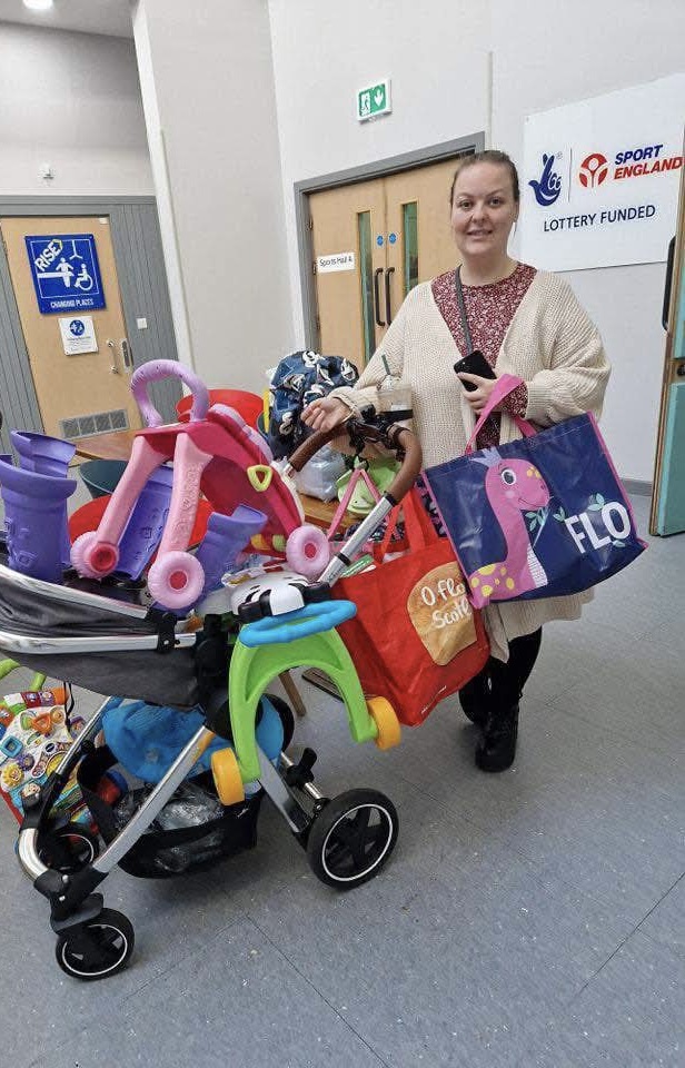 Attendees smile at previous Baby Boutique sale