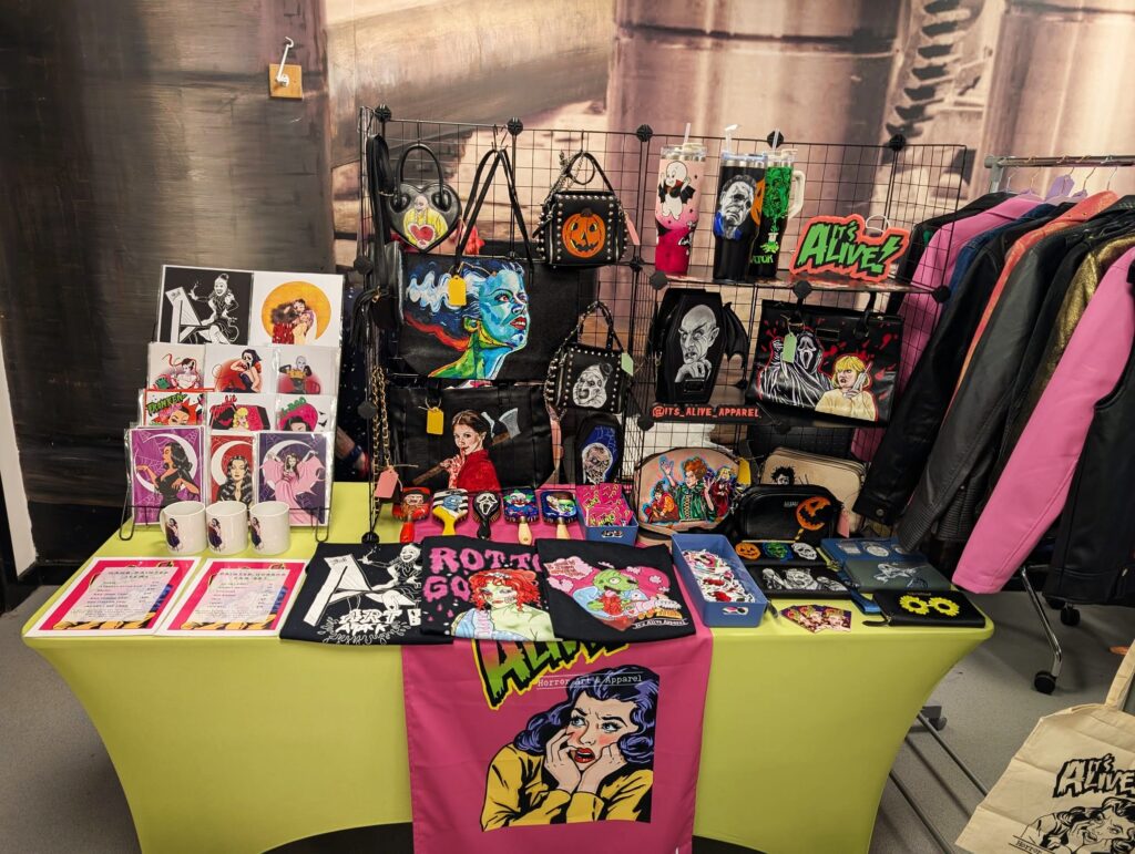 A stall of items handpainted by It's Alive Apparel