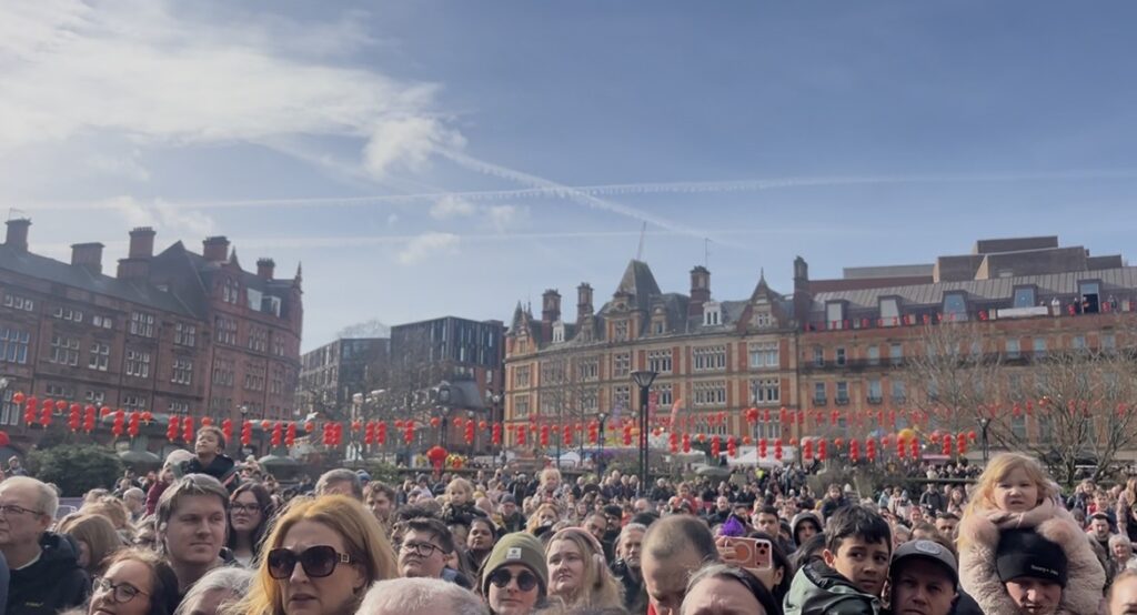 the crowd in Sheffield's peace Gardens