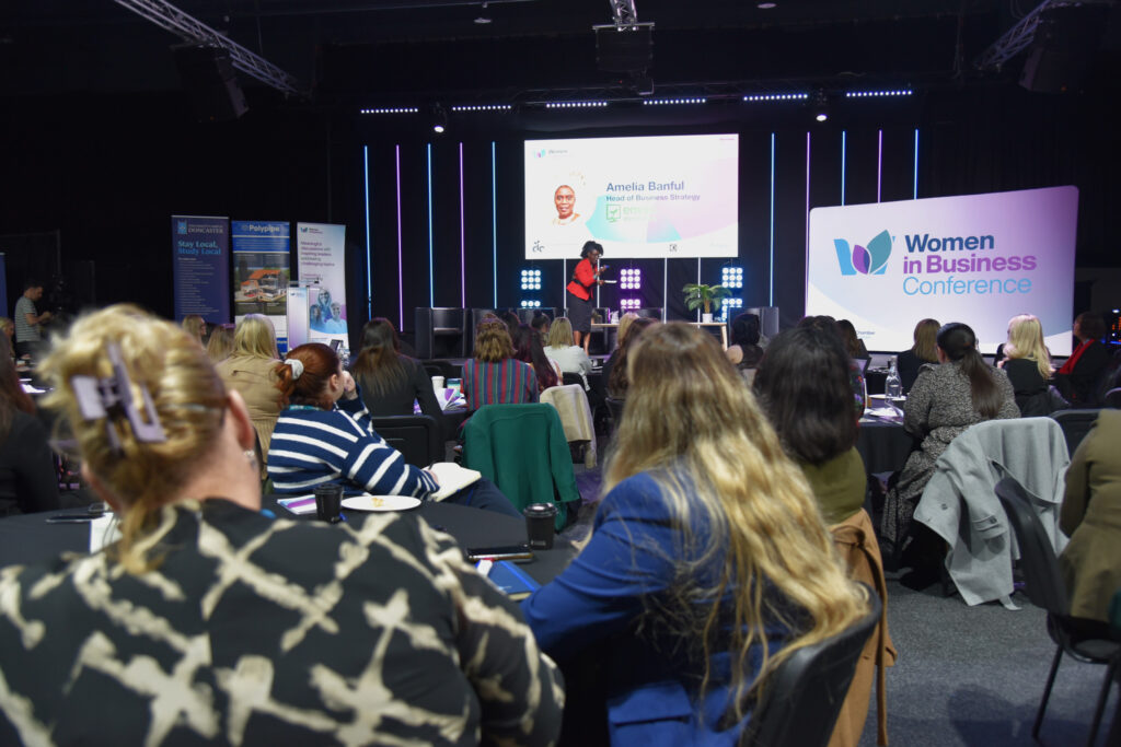 Women watching the conference