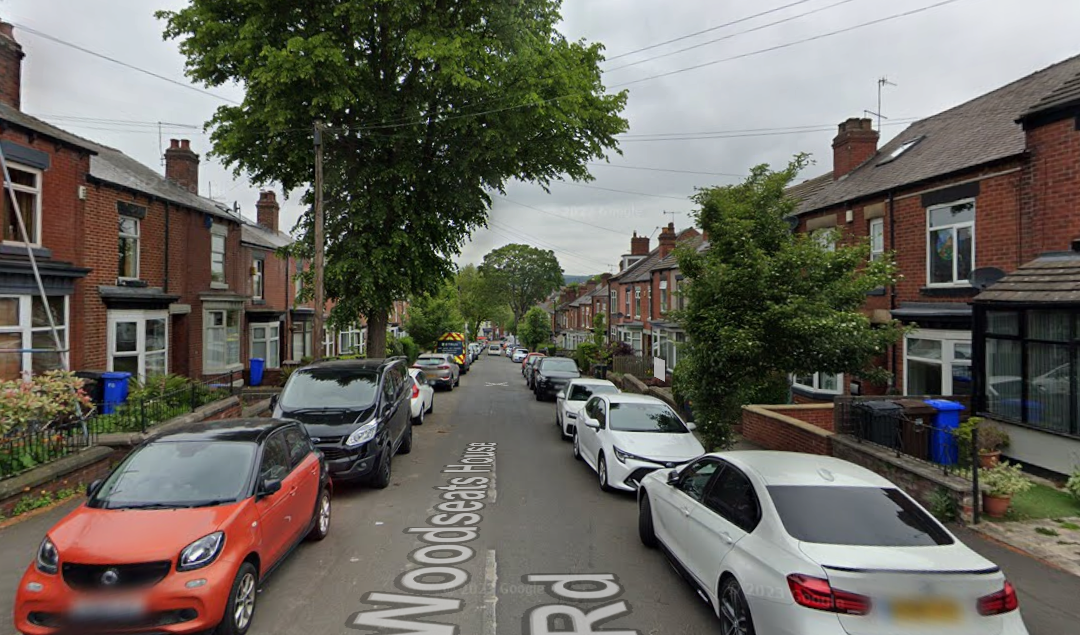 street view of Woodseats house road with cars and houses in shot