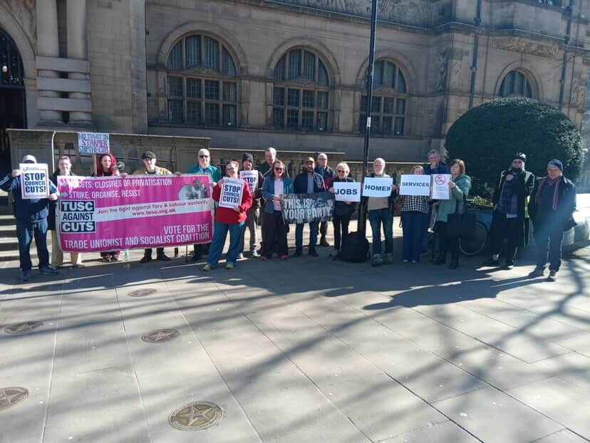 Campaigners gathered outside the city hall to rebel against budget cuts