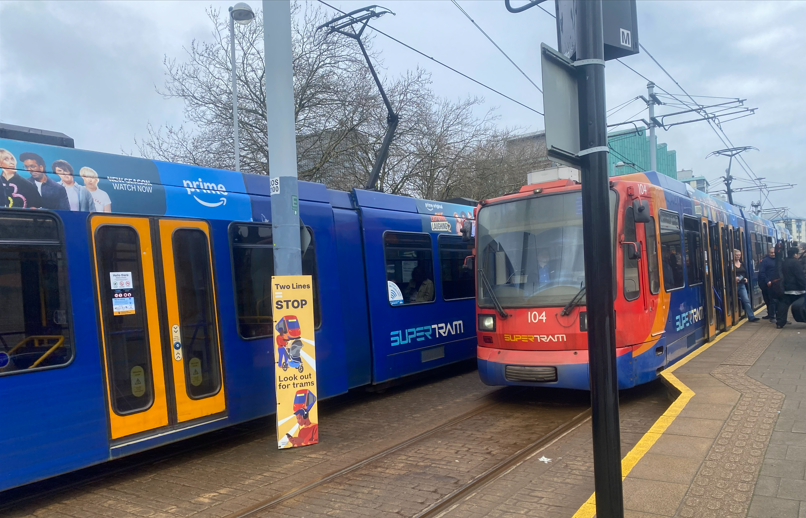 Image of two trams at the University of Sheffield Tram Station part of the SuperTram network