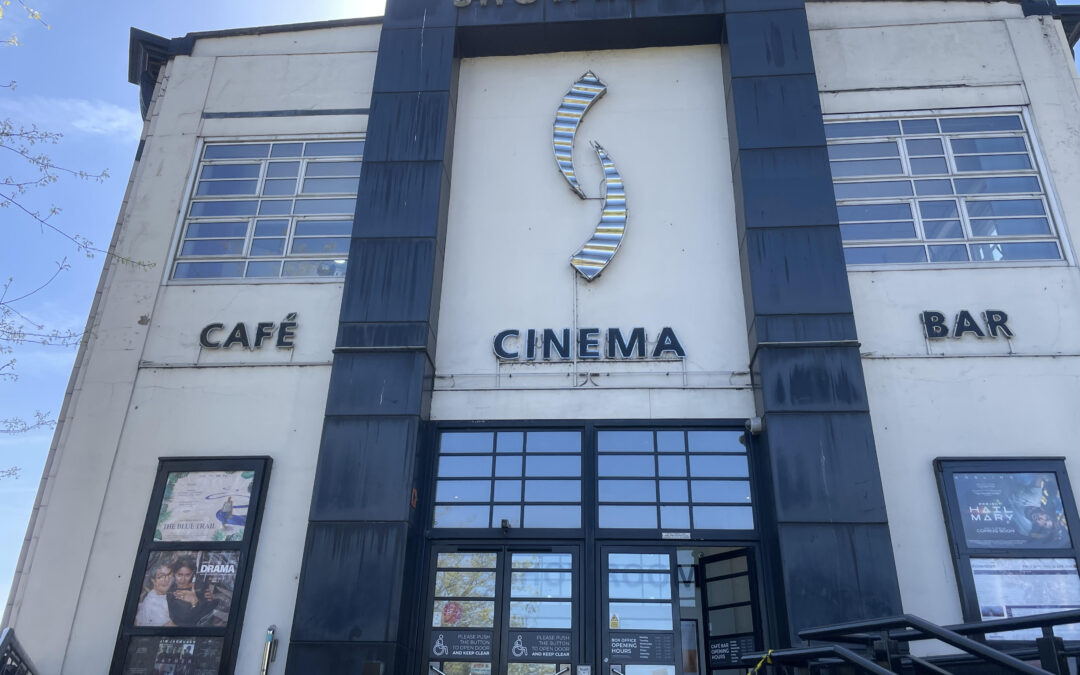 Photo of exterior of Showroom cinema in Sheffield with blue sky in background.