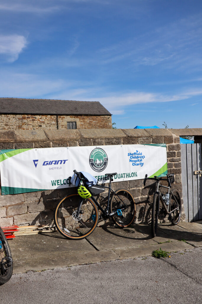 Two bikes in front of the Sheffield Duathlon banner
