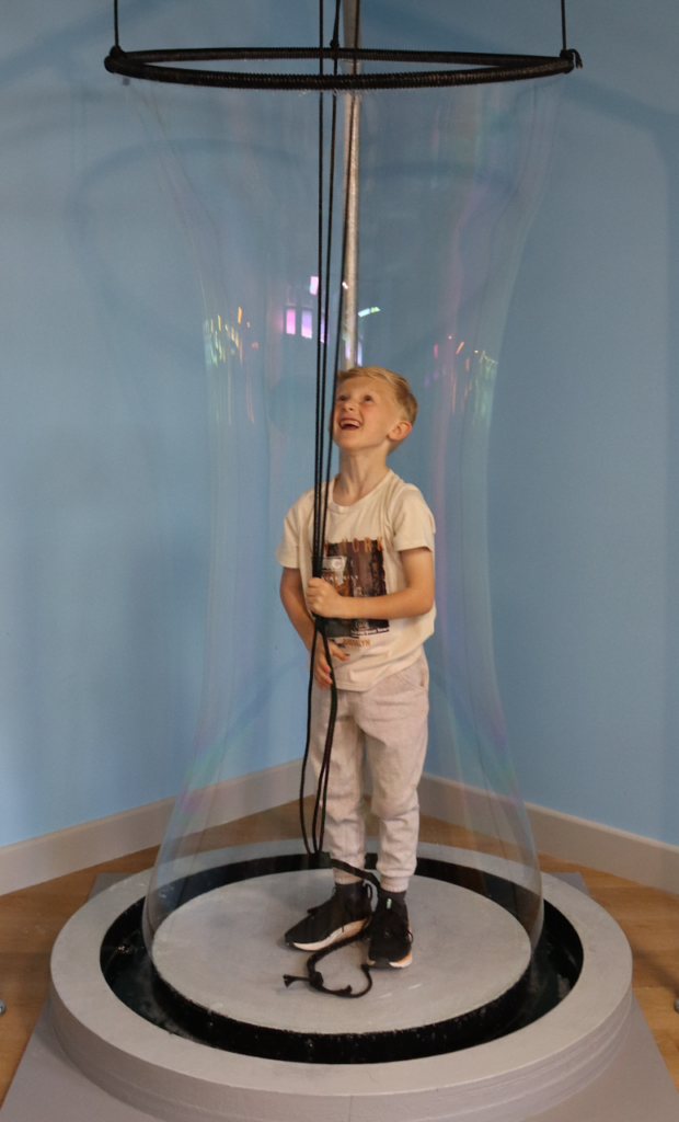 Boy in a long bubble 
