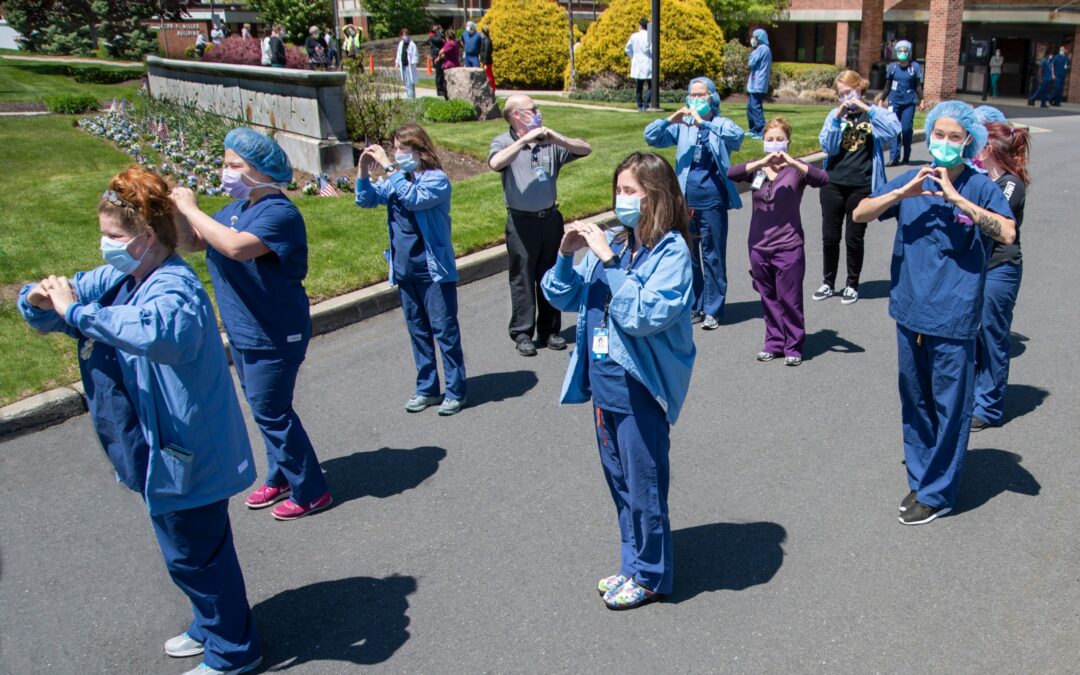 Nurses outside hospital